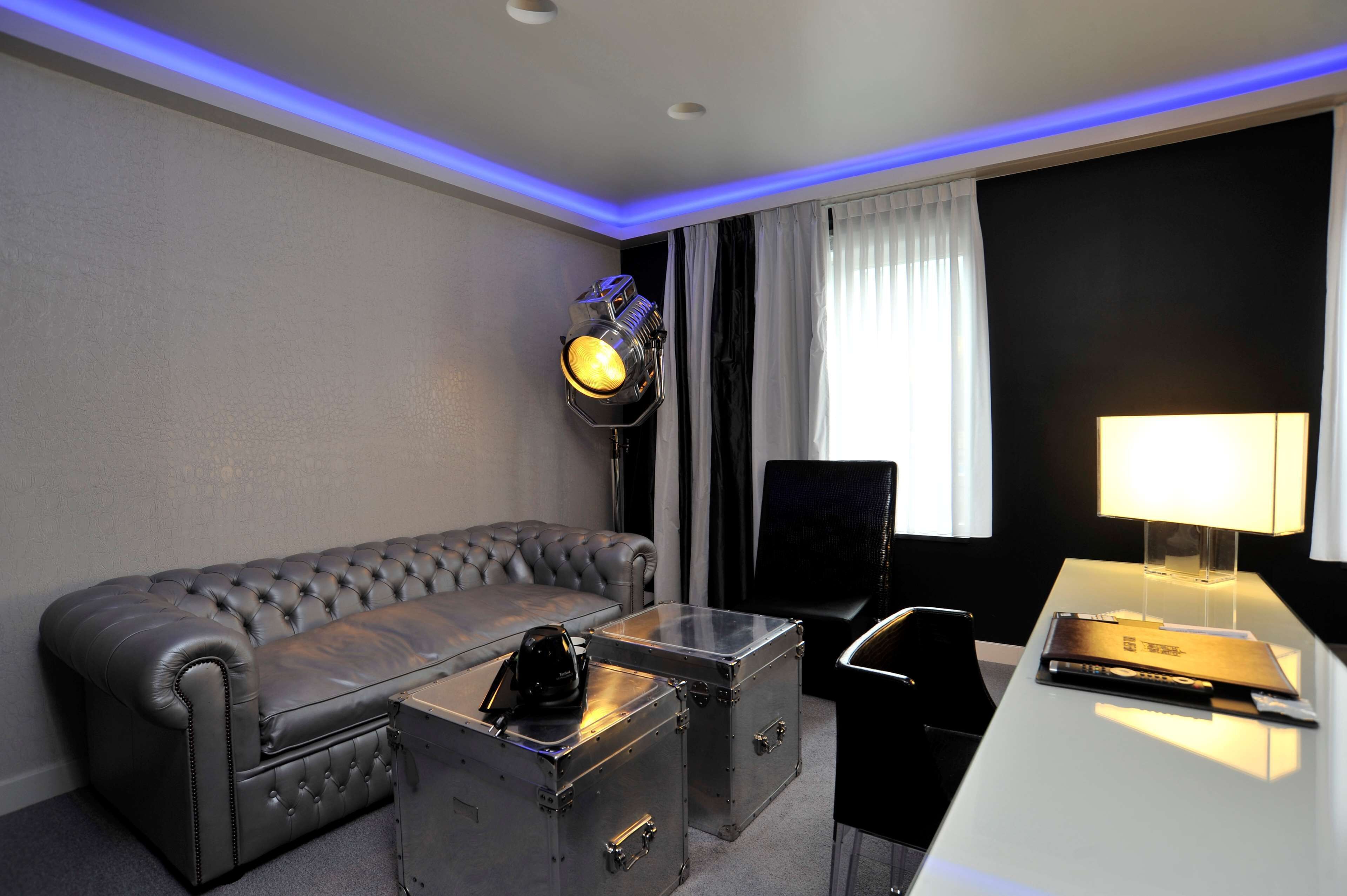 superior suite, multiple beds (theme) | 1 bedroom, desk, laptop workspace, blackout curtains