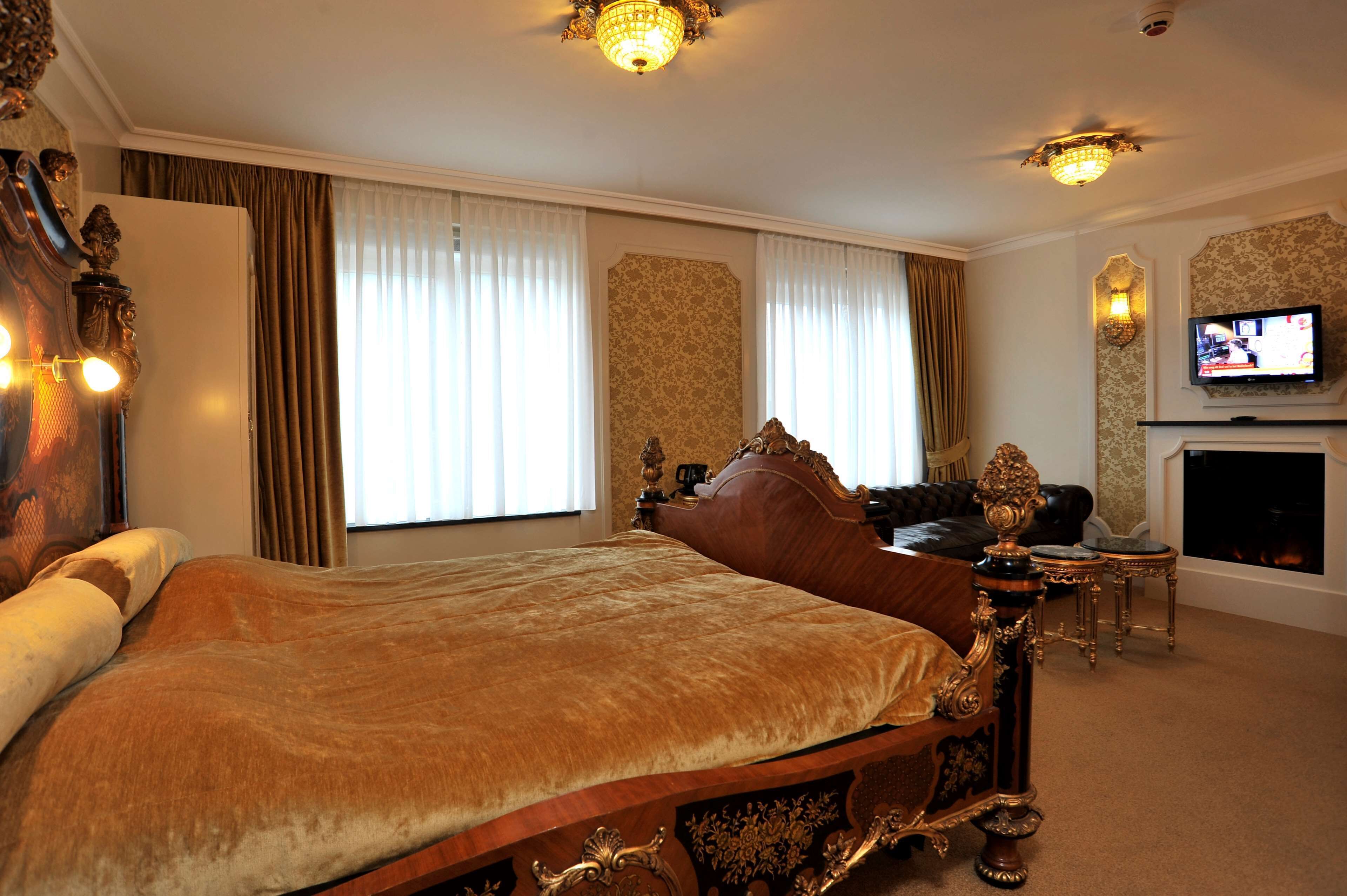 superior suite, multiple beds (theme) | 1 bedroom, desk, laptop workspace, blackout curtains