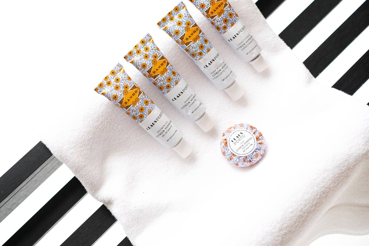 bathroom | hair dryer, towels, soap, shampoo