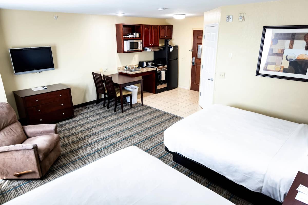 Pillow-top beds, desk, blackout curtains, iron/ironing board
