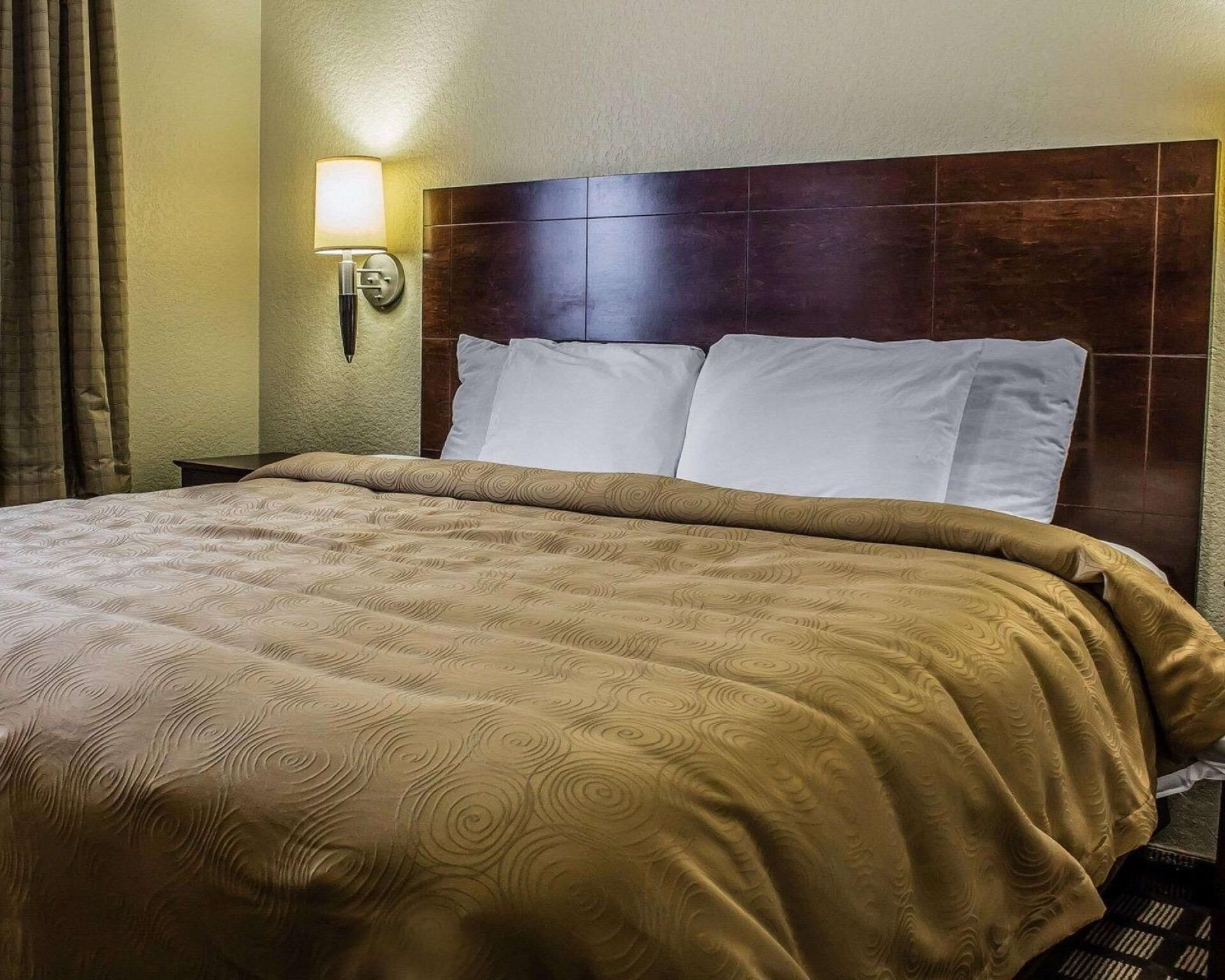 Pillow-top beds, desk, blackout curtains, iron/ironing board