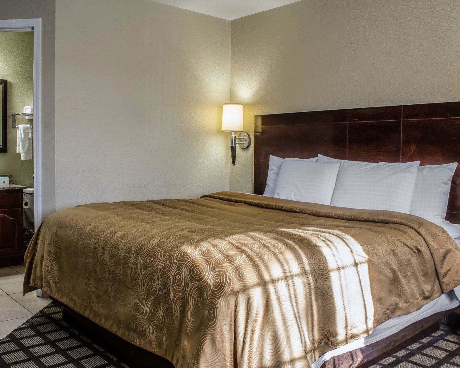 Pillow-top beds, desk, blackout curtains, iron/ironing board