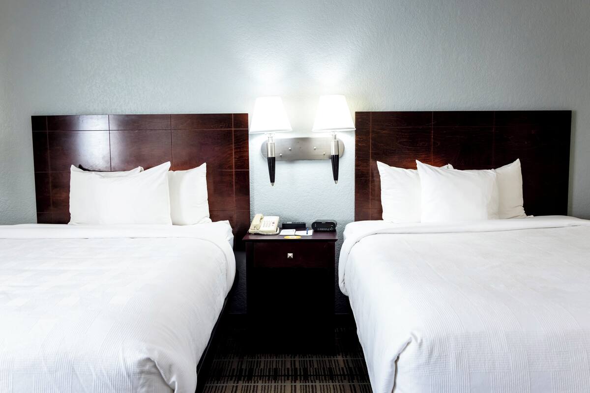 efficiency, standard room, 2 queen beds, non smoking, kitchen | pillow-top beds, desk, blackout curtains, iron/ironing board