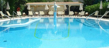 Outdoor pool, open 9 AM to 6 PM, pool umbrellas, sun loungers