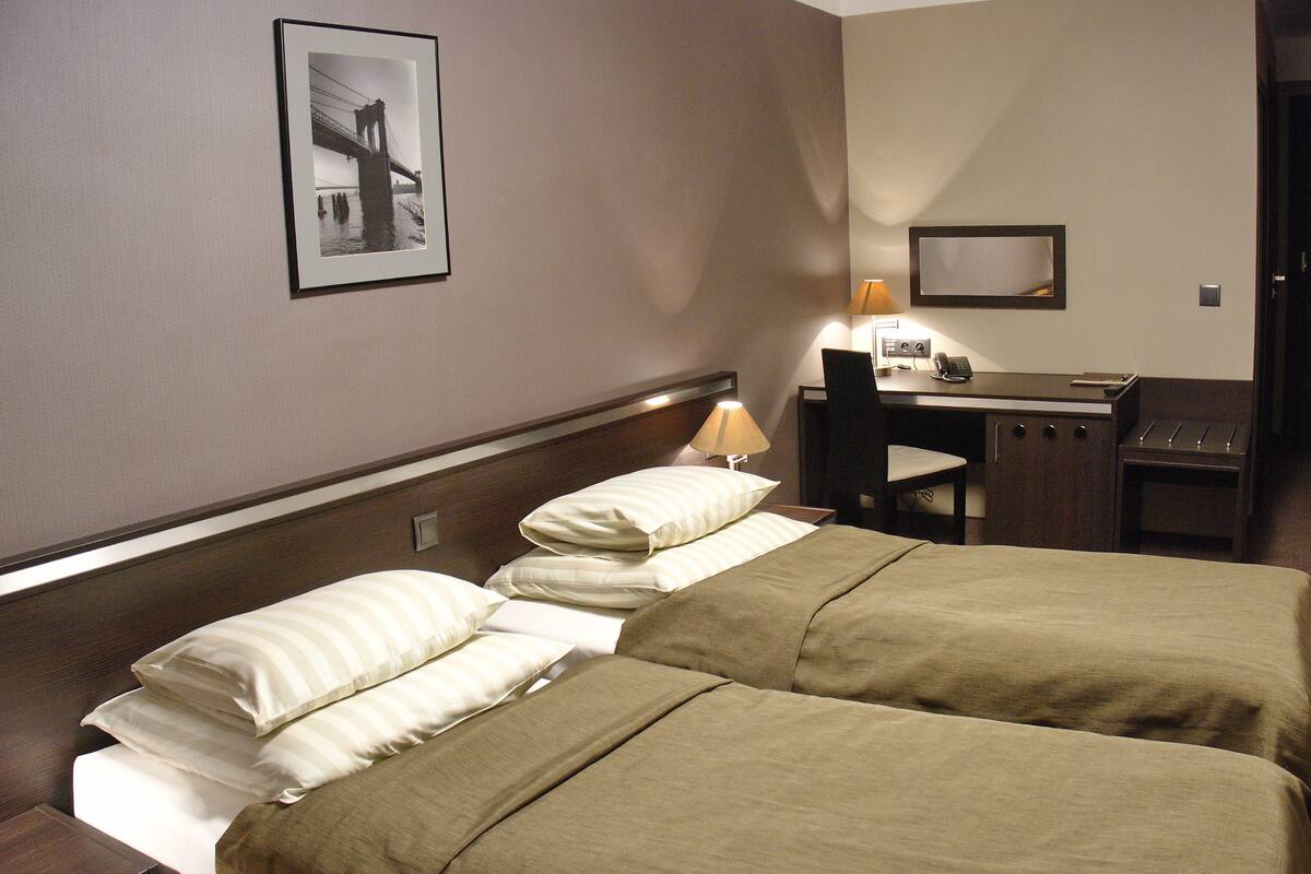 Desk, blackout curtains, iron/ironing board (on request), free WiFi