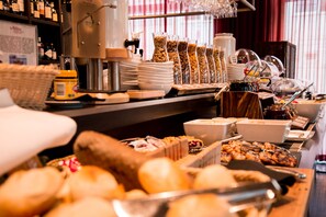 Daily buffet breakfast (EUR 23 per person) - Adina Apartment Hotel Berlin CheckPoint Charlie (Berlin)