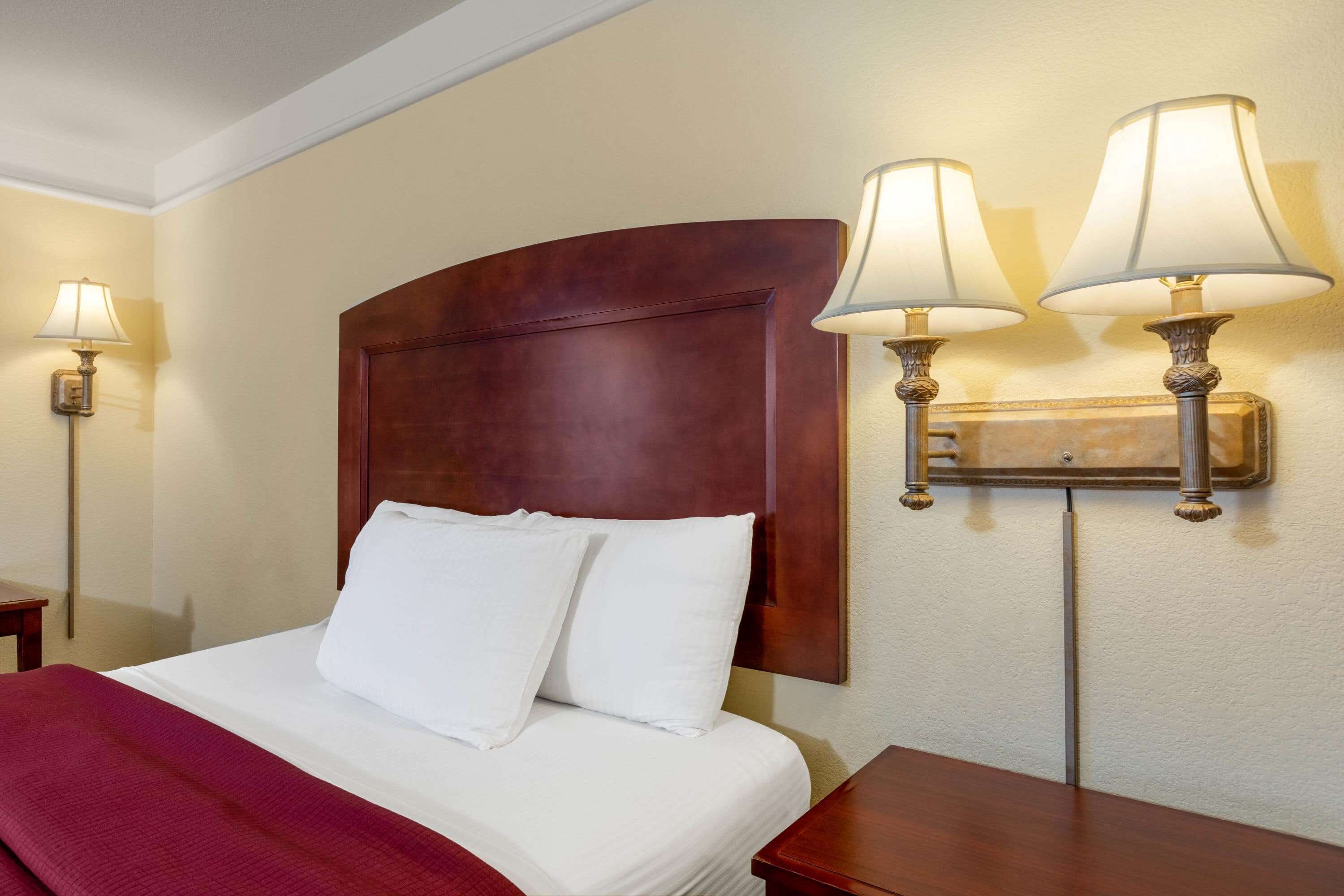 premium bedding, desk, blackout curtains, iron/ironing board