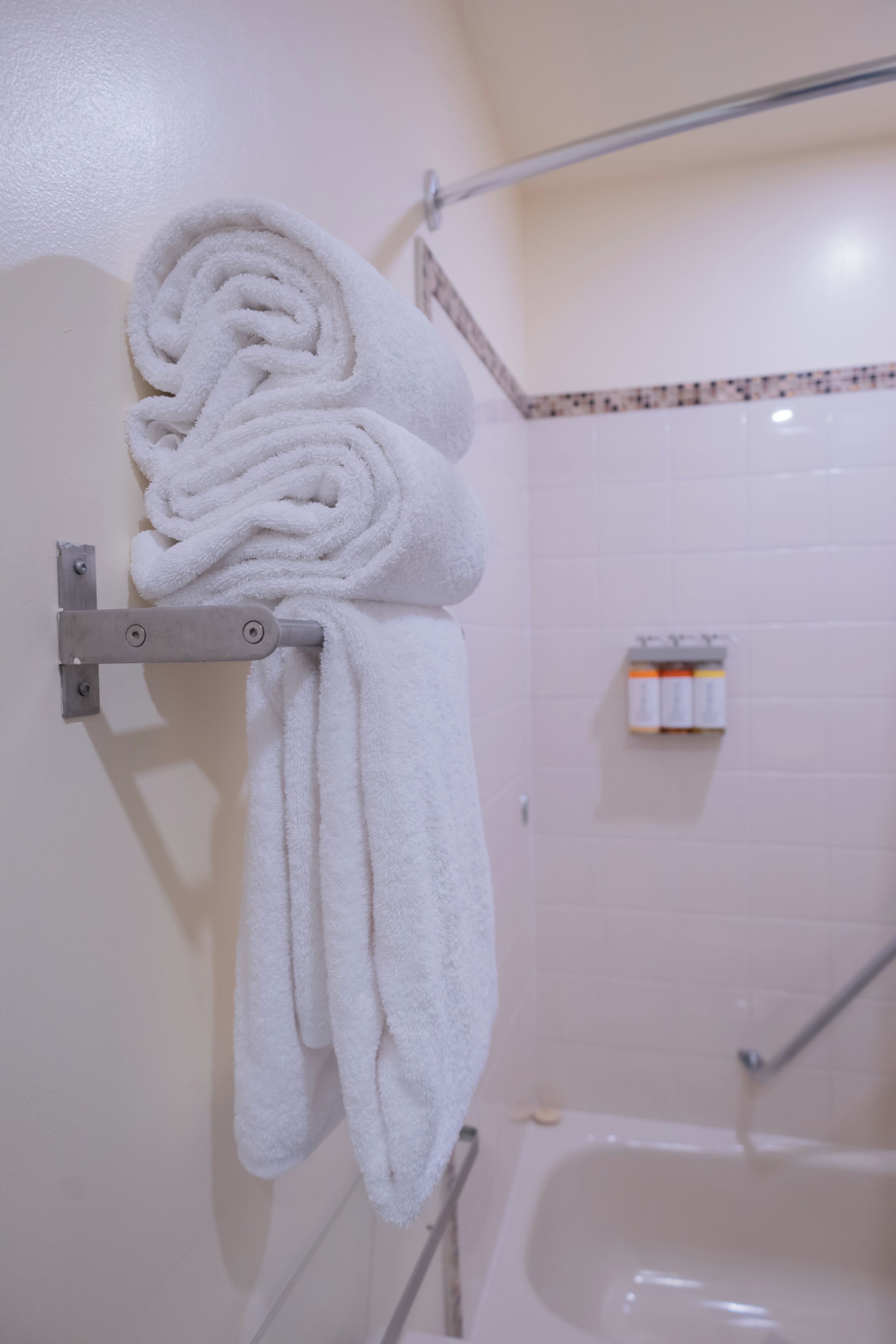 combined shower/bathtub, rainfall showerhead, hair dryer, bathrobes