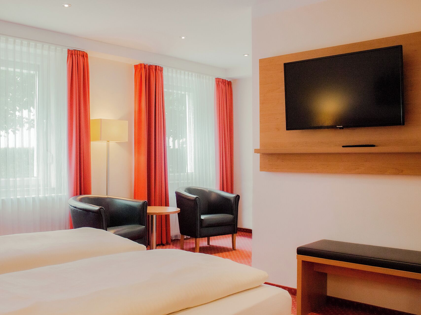 Select Comfort beds, minibar, desk, blackout curtains