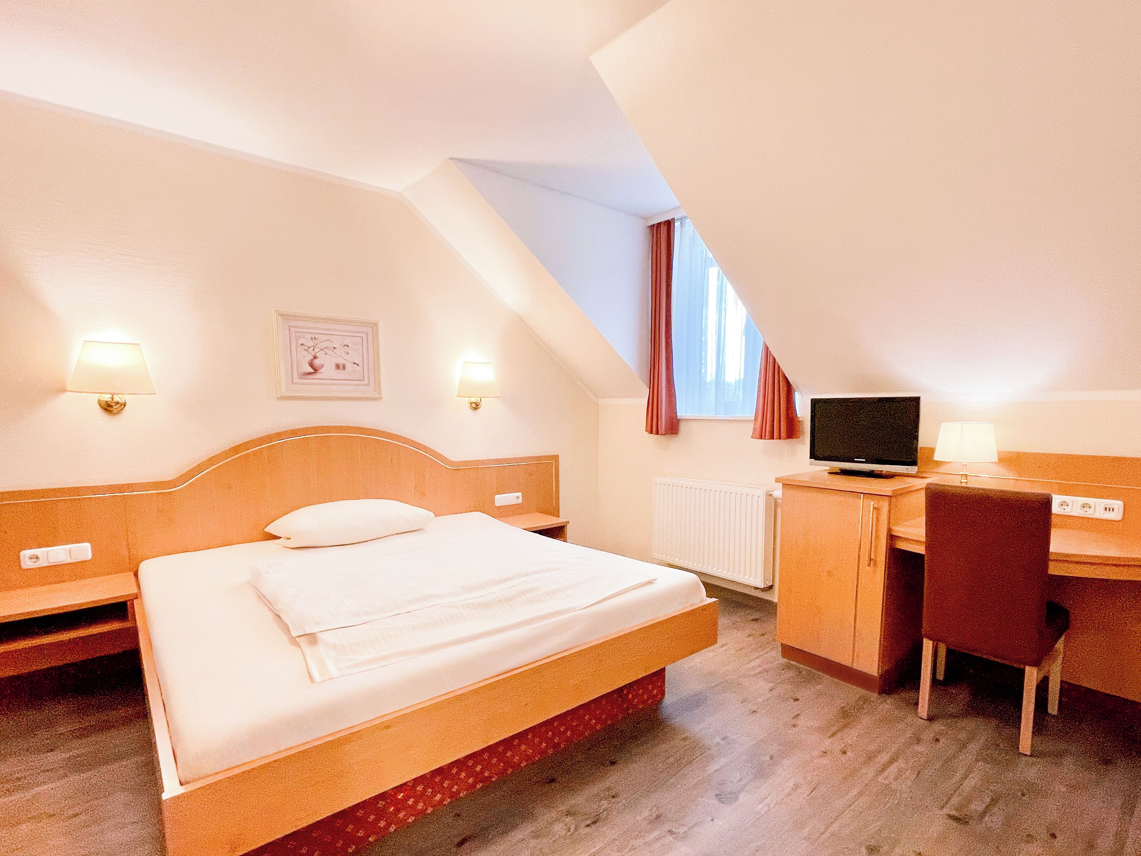 Select Comfort beds, minibar, desk, blackout curtains