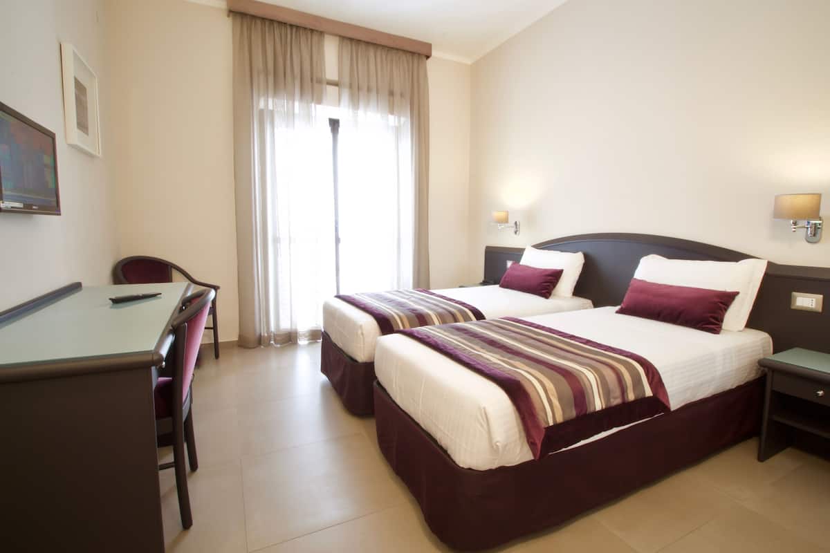 Standard Double or Twin Room | 1 bedroom, in-room safe, desk, blackout curtains