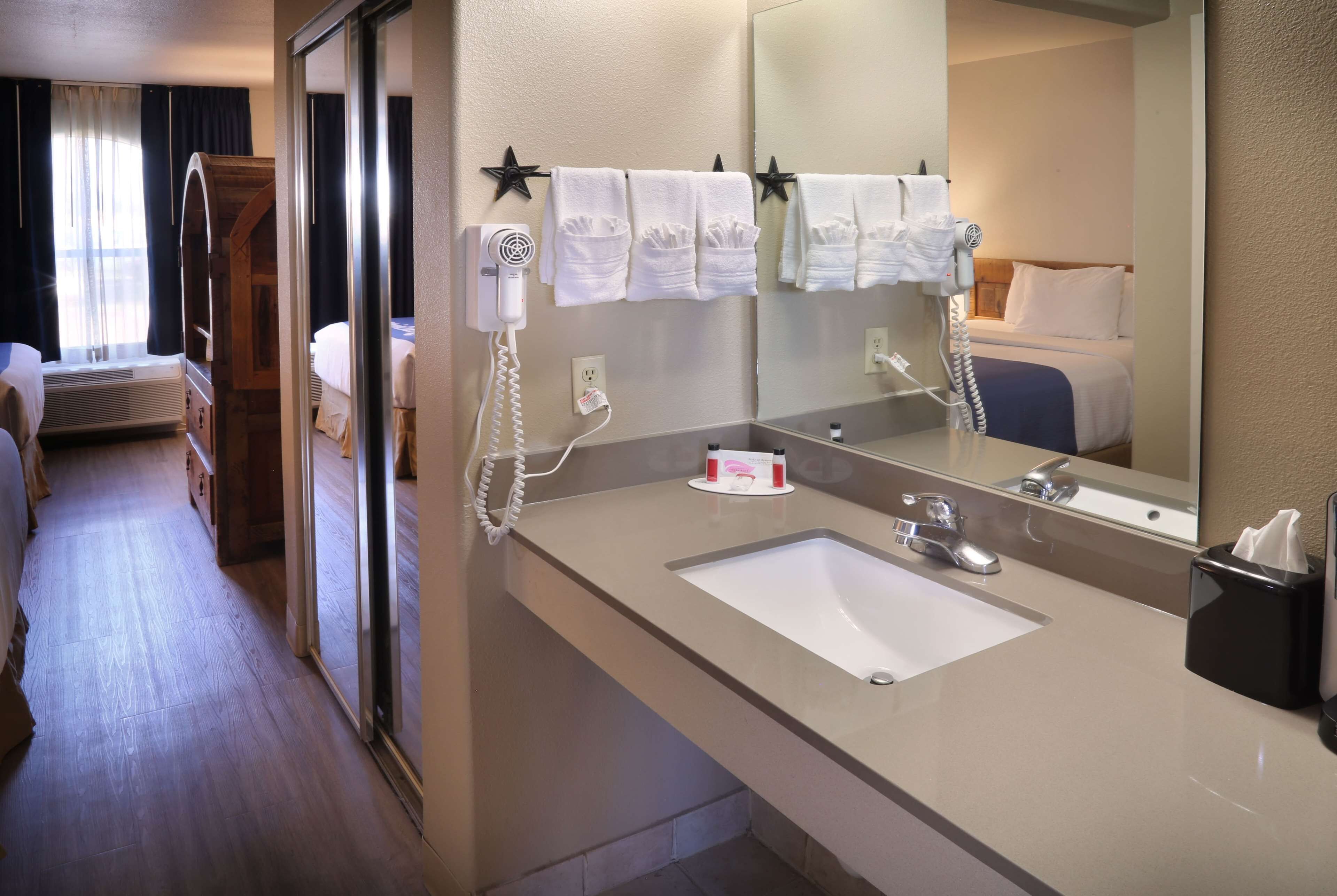 deep-soaking bathtub, free toiletries, hair dryer, towels