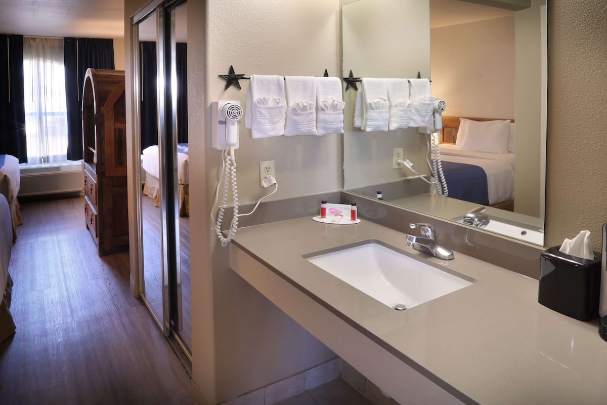 deep-soaking bathtub, free toiletries, hair dryer, towels