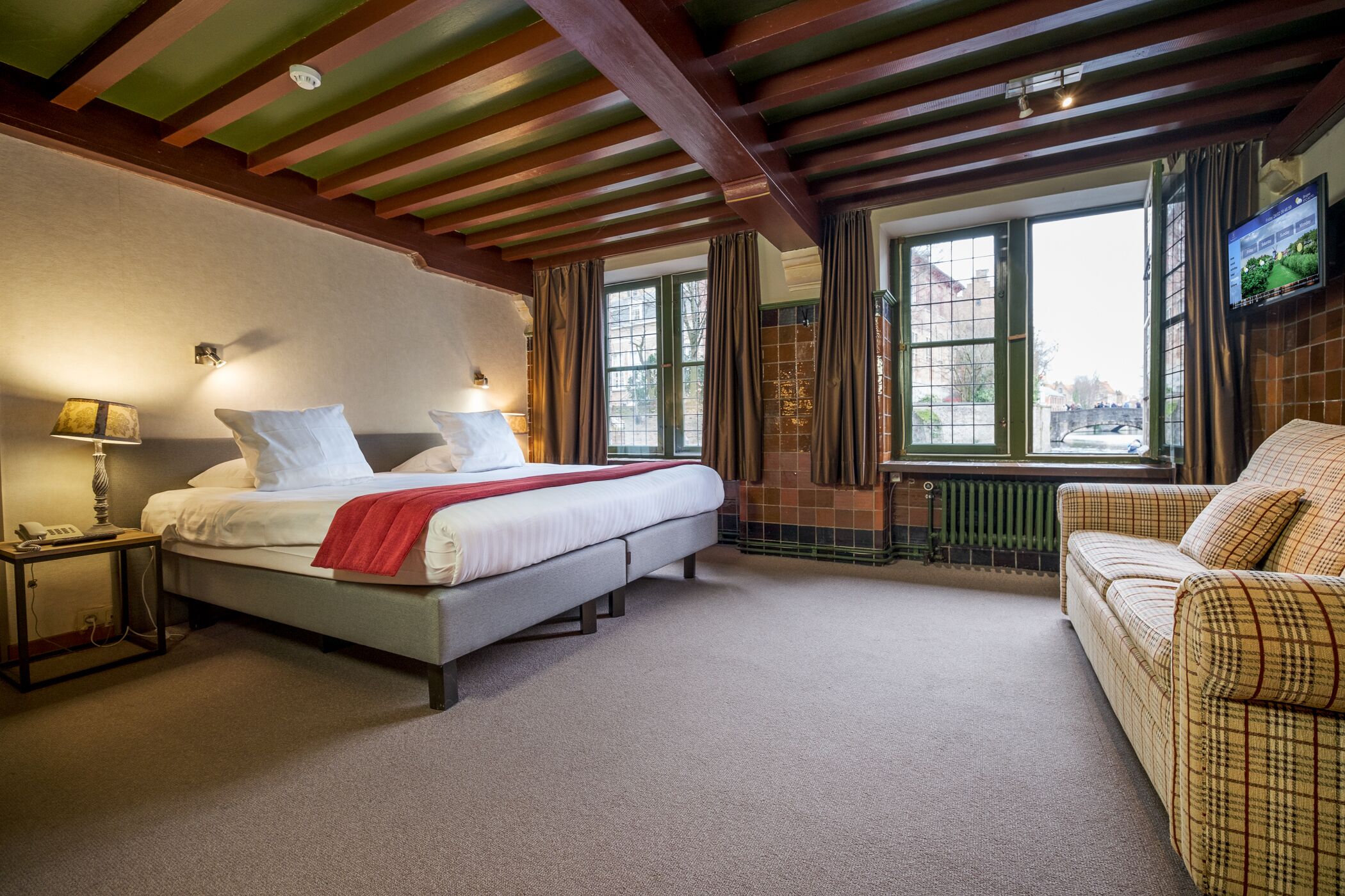 basic double or twin room, canal view | in-room safe, blackout curtains, cots/infant beds, free wifi