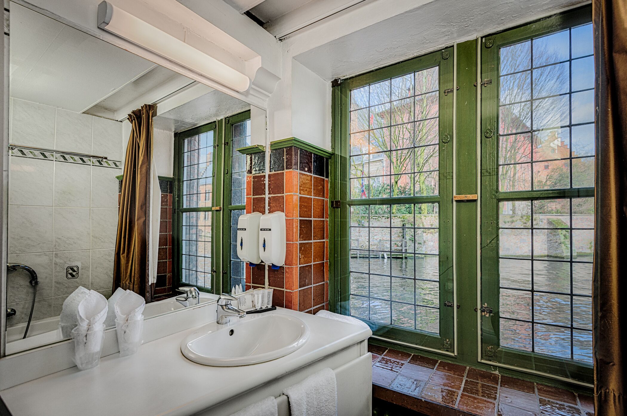 basic double or twin room, canal view | bathroom | hair dryer, towels