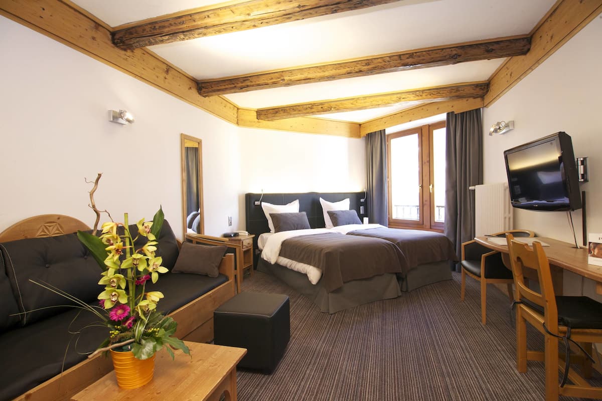 Ropa de cama de alta calidad, minibar, escritorio y insonorización