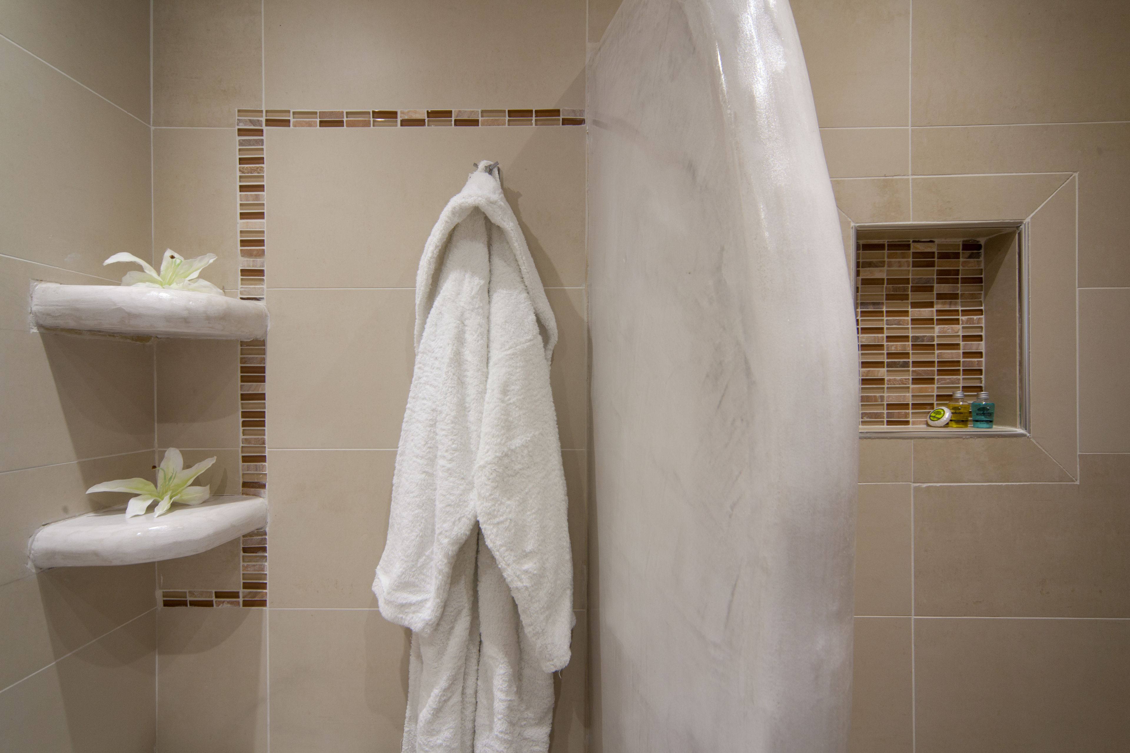 jetted bath, rainfall showerhead, free toiletries, hair dryer