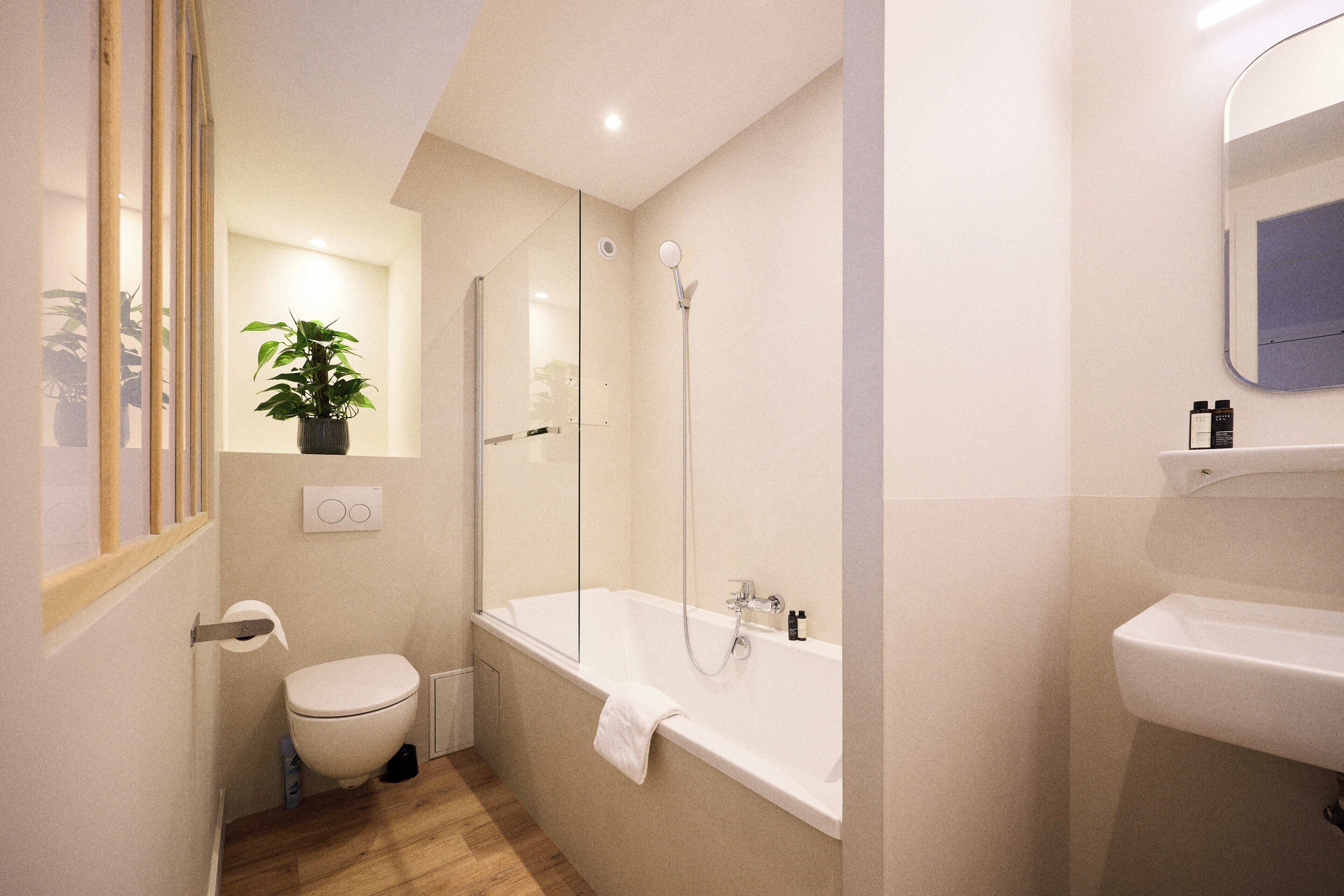 Superior Double | Bathroom | Hair dryer, towels, soap, shampoo