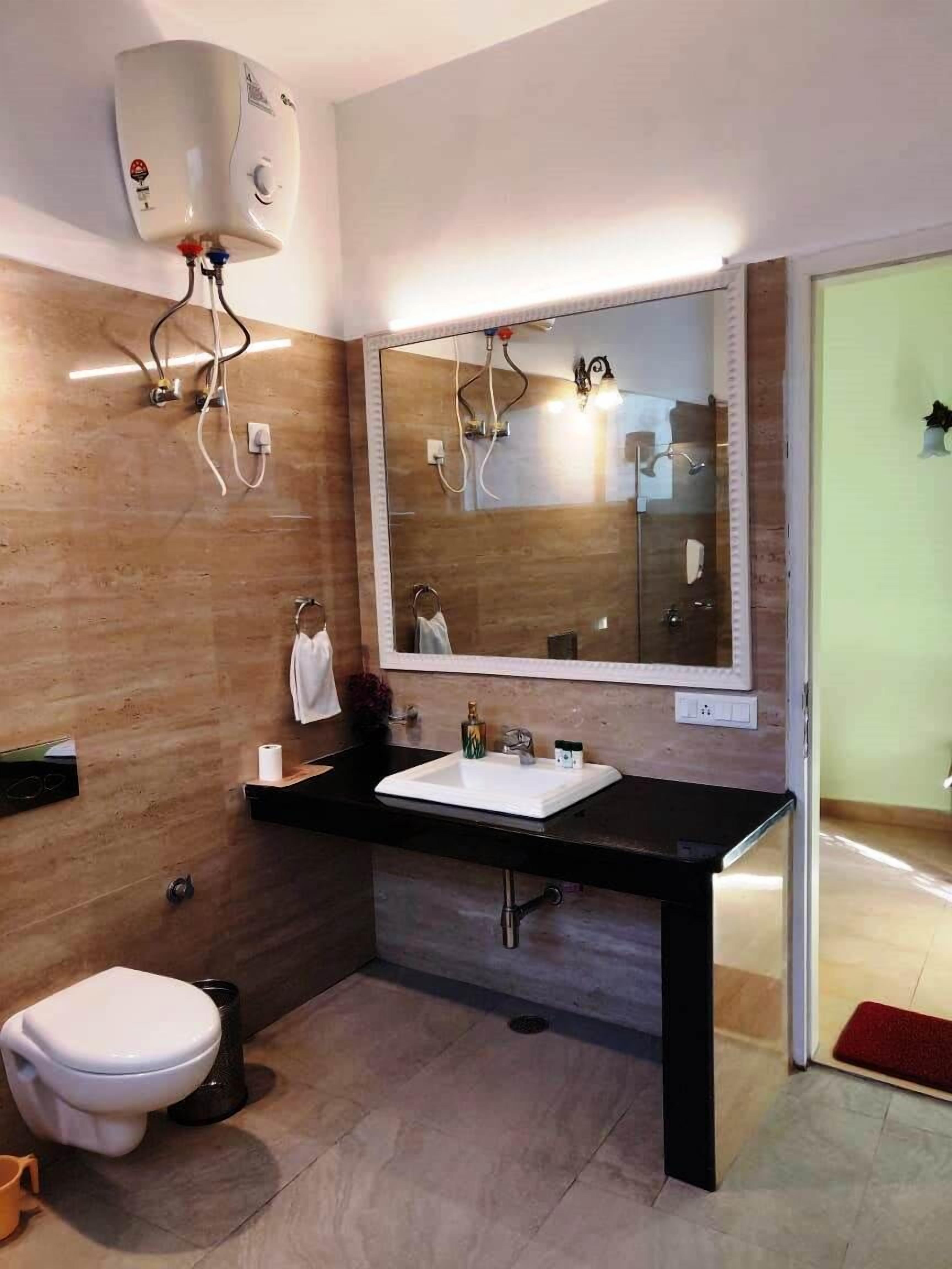 shower, rainfall showerhead, designer toiletries, hair dryer