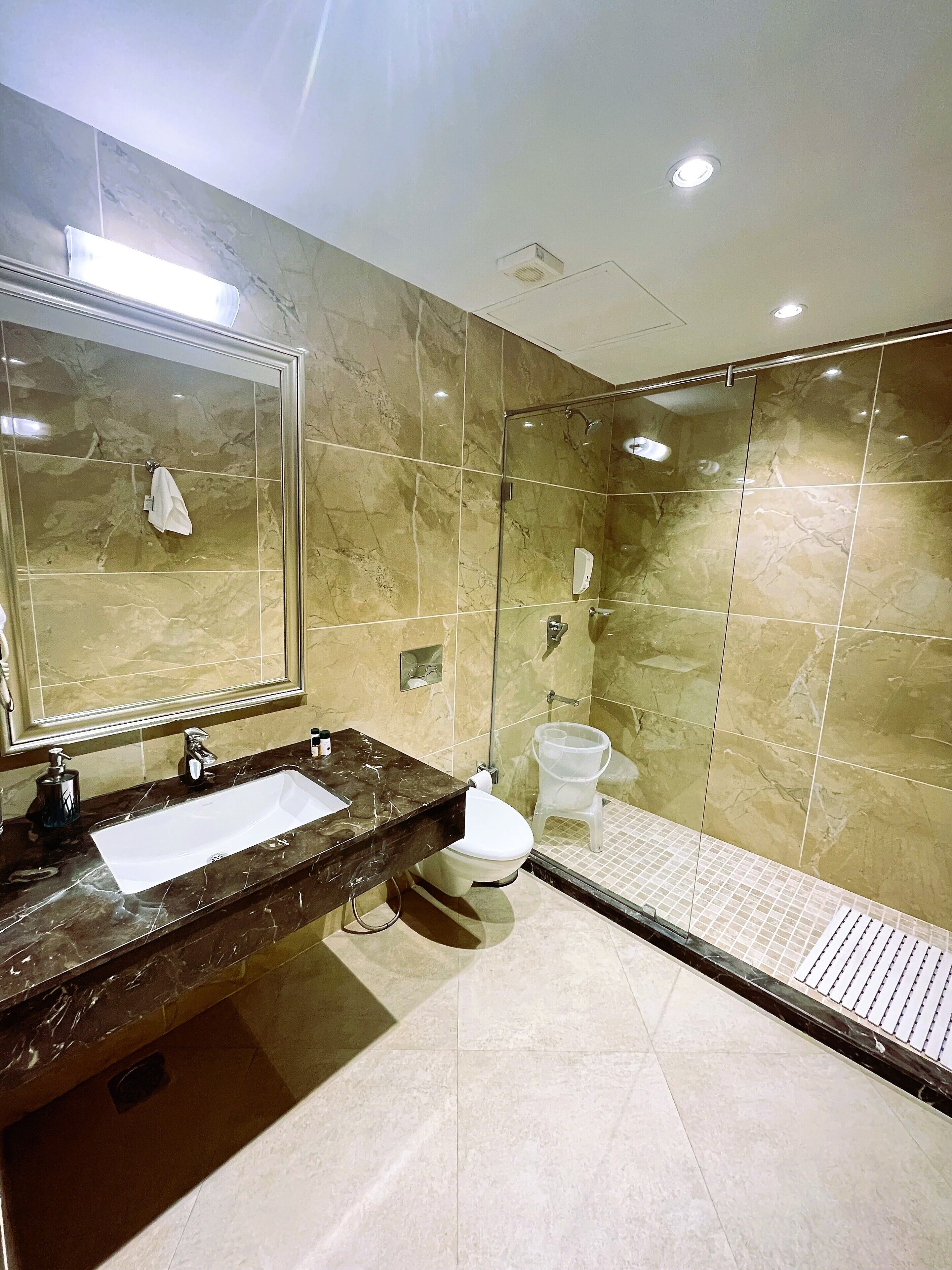 superior room, 1 queen bed | bathroom | shower, rainfall showerhead, designer toiletries, hair dryer