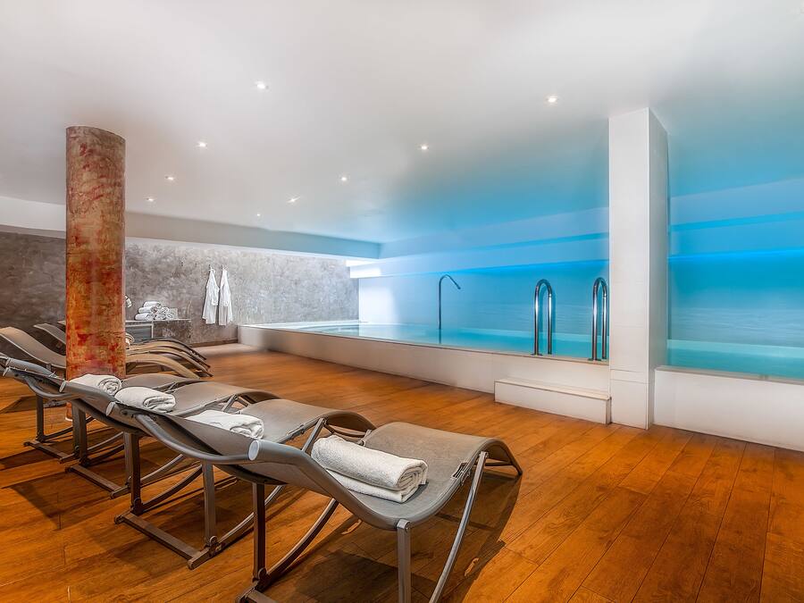 Indoor pool, open 9:00 AM to 9:00 PM, sun loungers