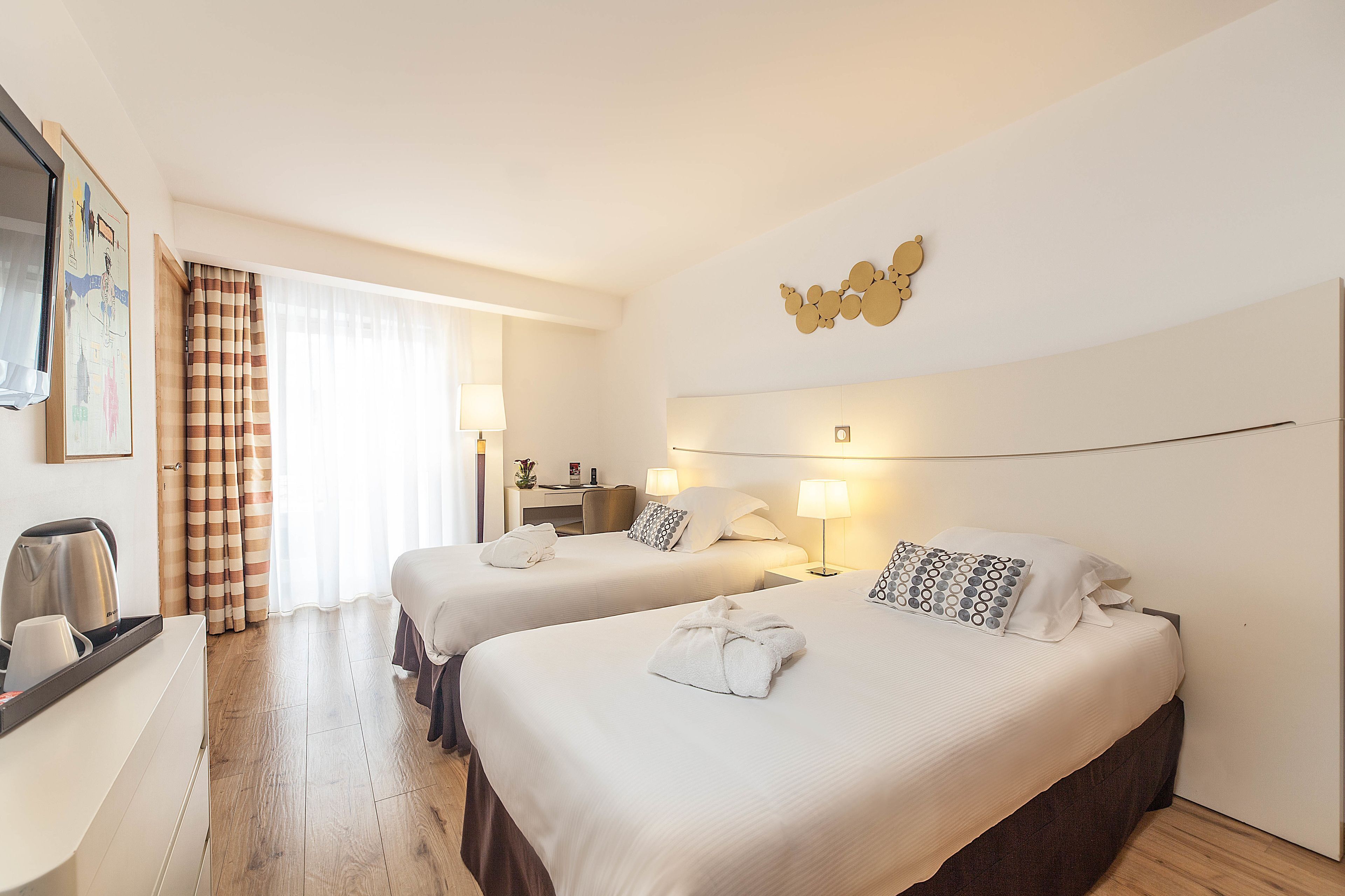 Premium bedding, pillowtop beds, minibar, in-room safe