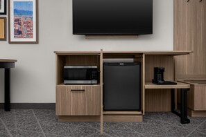 A kitchenette with a microwave, refrigerator, and coffee maker. - Hampton Inn & Suites Colorado Springs/I-25 South (Colorado Springs)