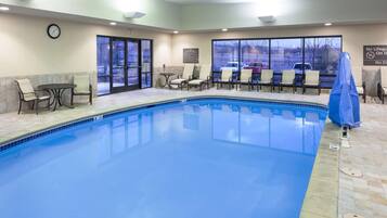 Indoor pool, open 6 AM to midnight, pool loungers