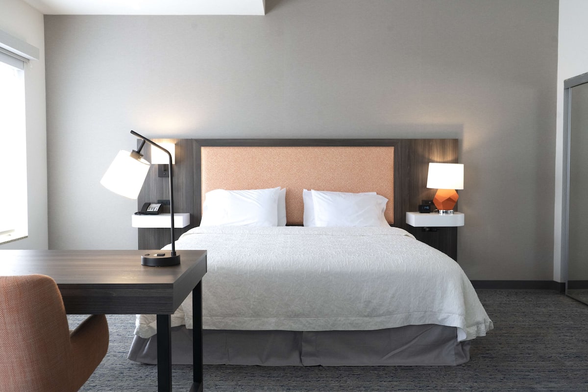 premium bedding, desk, blackout curtains, iron/ironing board