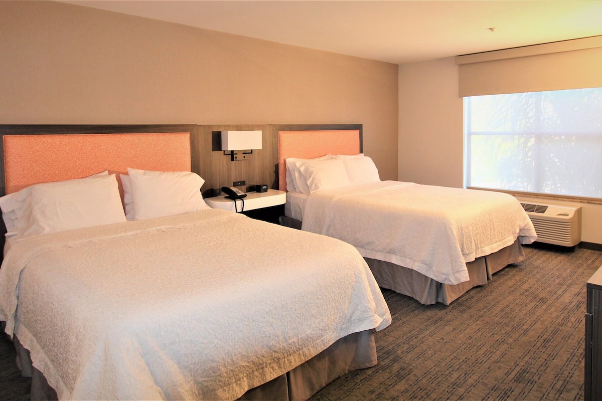 premium bedding, desk, blackout curtains, iron/ironing board