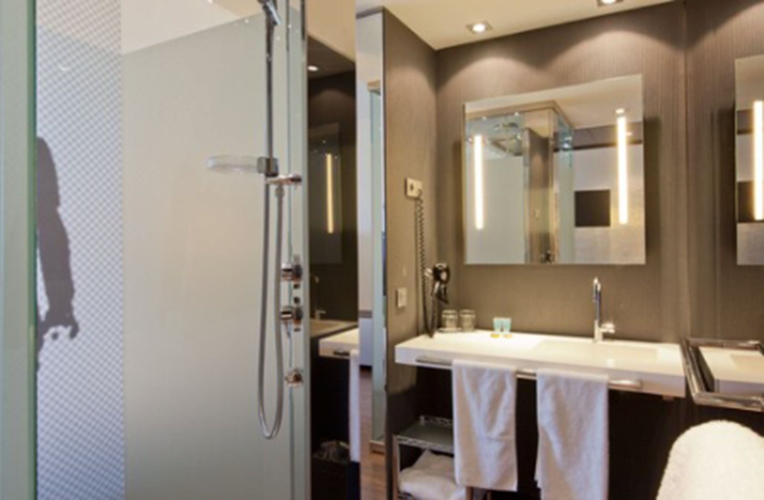 standard twin room | bathroom | shower, rainfall showerhead, designer toiletries, hair dryer