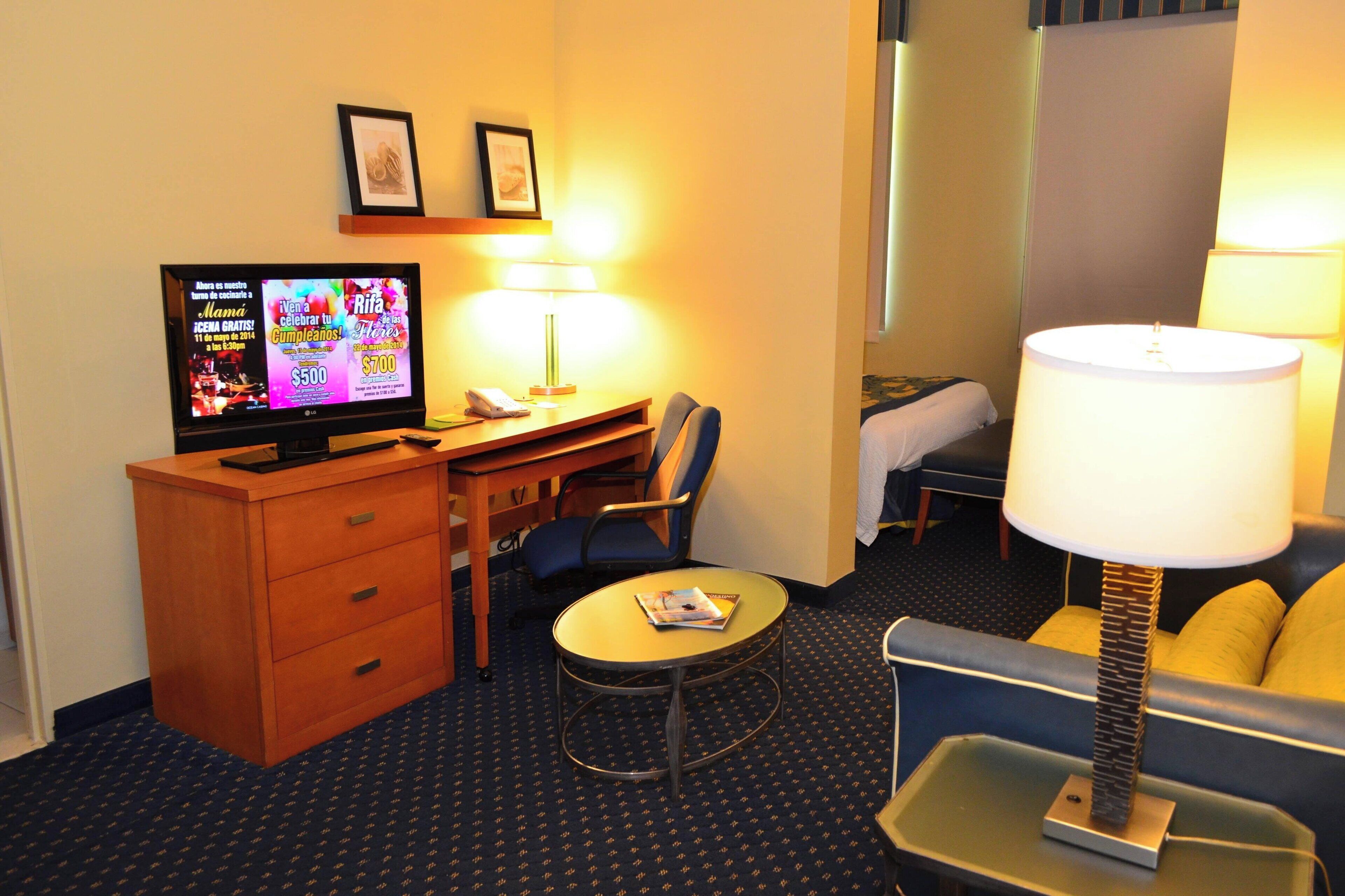 premium bedding, tempur-pedic beds, in-room safe, blackout curtains