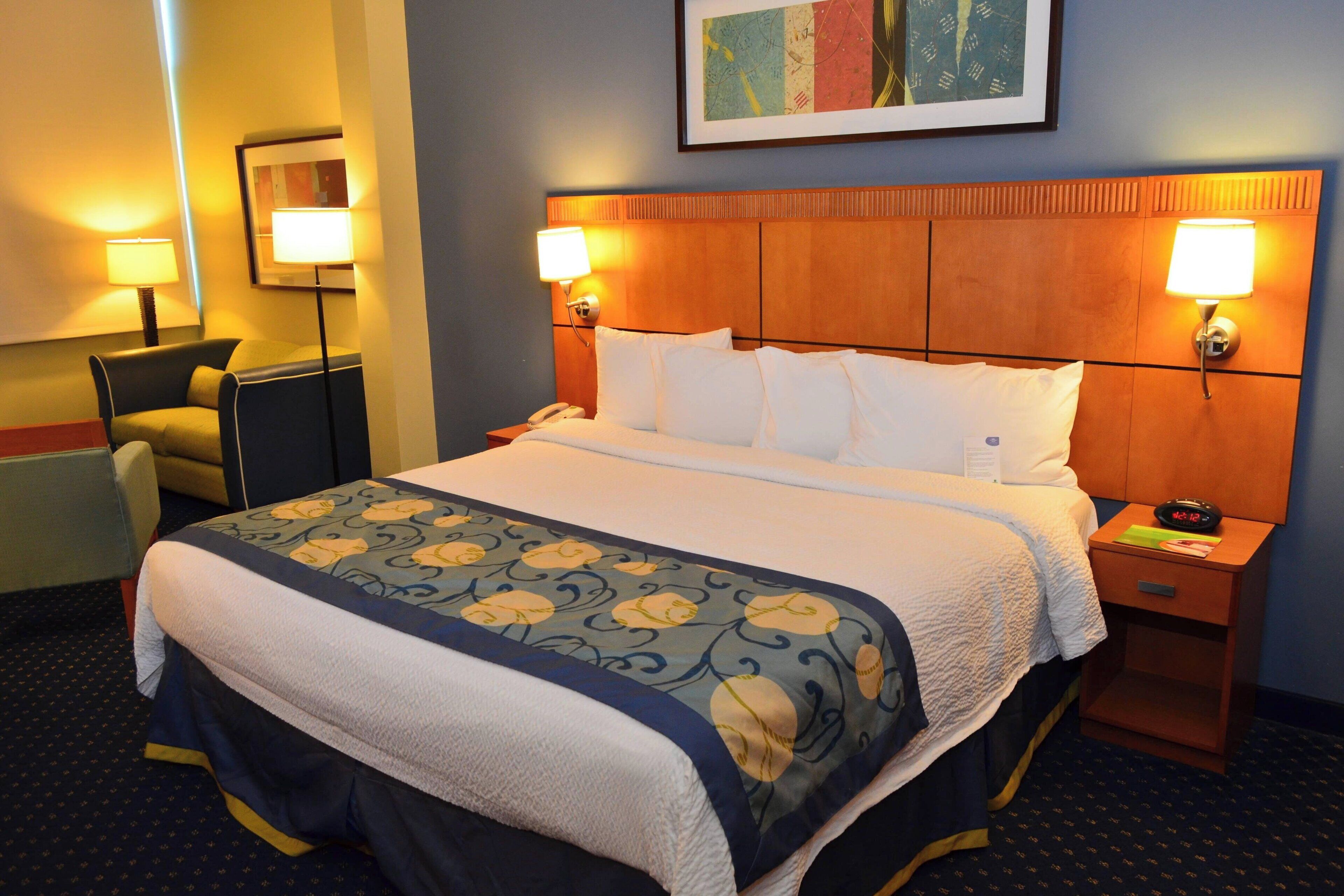 premium bedding, tempur-pedic beds, in-room safe, blackout curtains