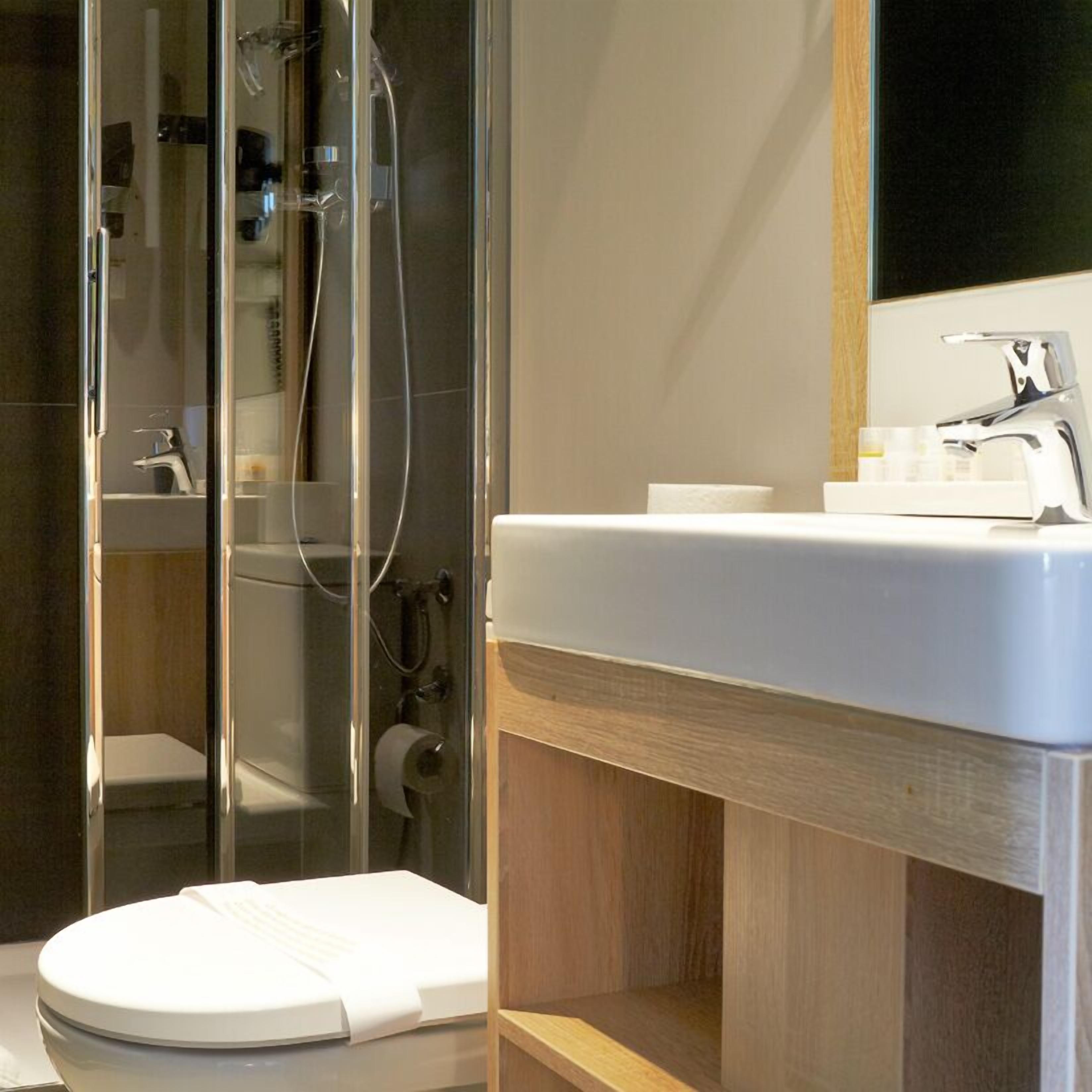 shower, rainfall showerhead, designer toiletries, hair dryer