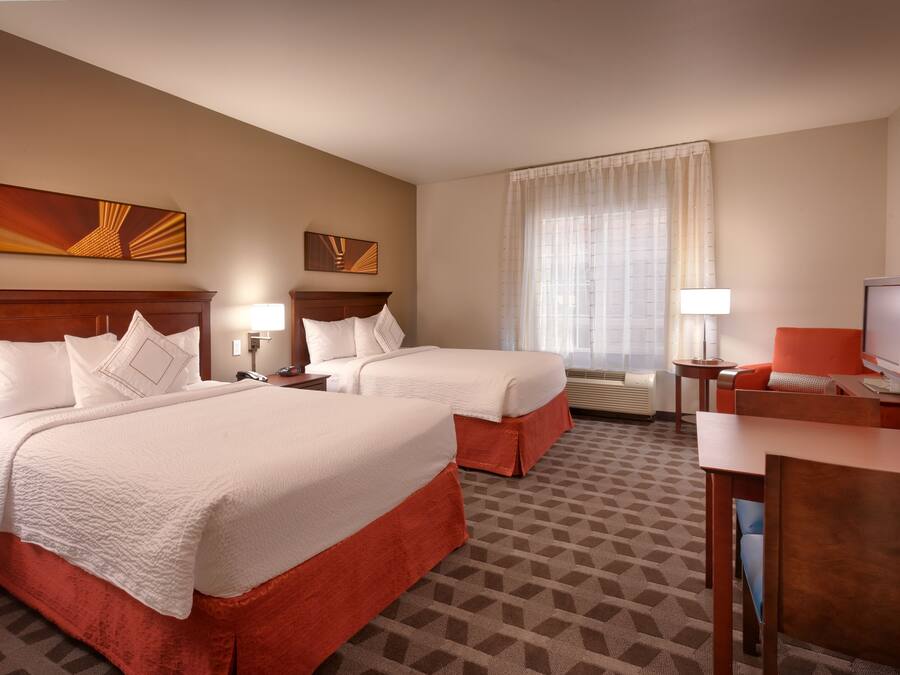 Premium bedding, individually furnished, laptop workspace