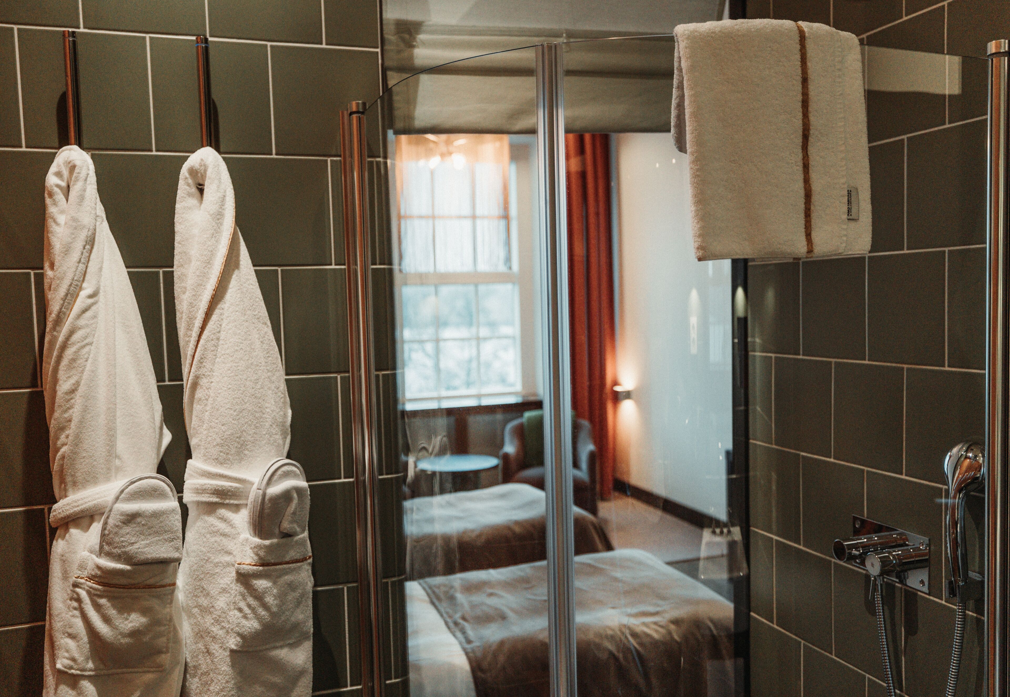 superior double room with lake view | bathroom | free toiletries, hair dryer, towels