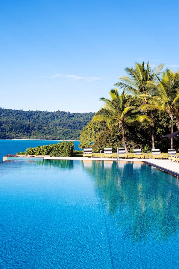 2 outdoor pools, pool umbrellas, pool loungers