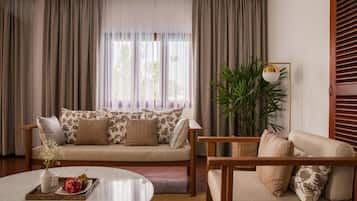 EXECUTIVE SUITE | Living room | 43-inch Smart TV with cable channels, TV, DVD player