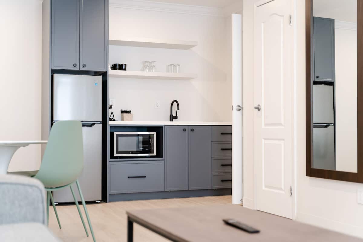 suite, 1 king bed with sofa bed, non smoking | blackout curtains, iron/ironing board, free cots/infant beds