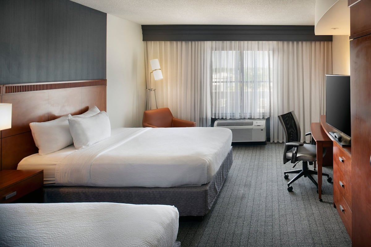 premium bedding, desk, blackout curtains, iron/ironing board