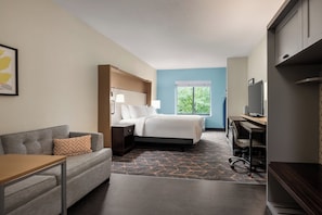 Premium bedding, desk, laptop workspace, iron/ironing board