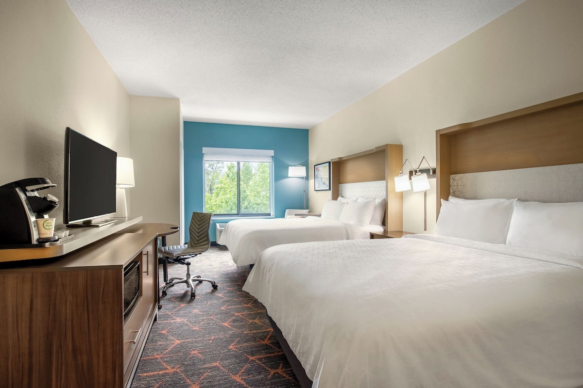 Premium bedding, desk, laptop workspace, iron/ironing board