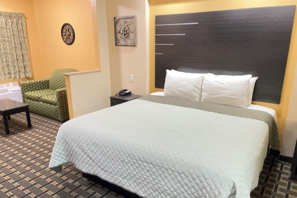 Deluxe kamer, 1 kingsize bed, niet-roken | Een strijkplank/strijkijzer, gratis wifi, beddengoed