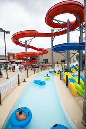 A water park with multiple slides and inflatable tubes.