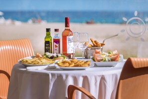 Breakfast, lunch, dinner served; international cuisine, beach views