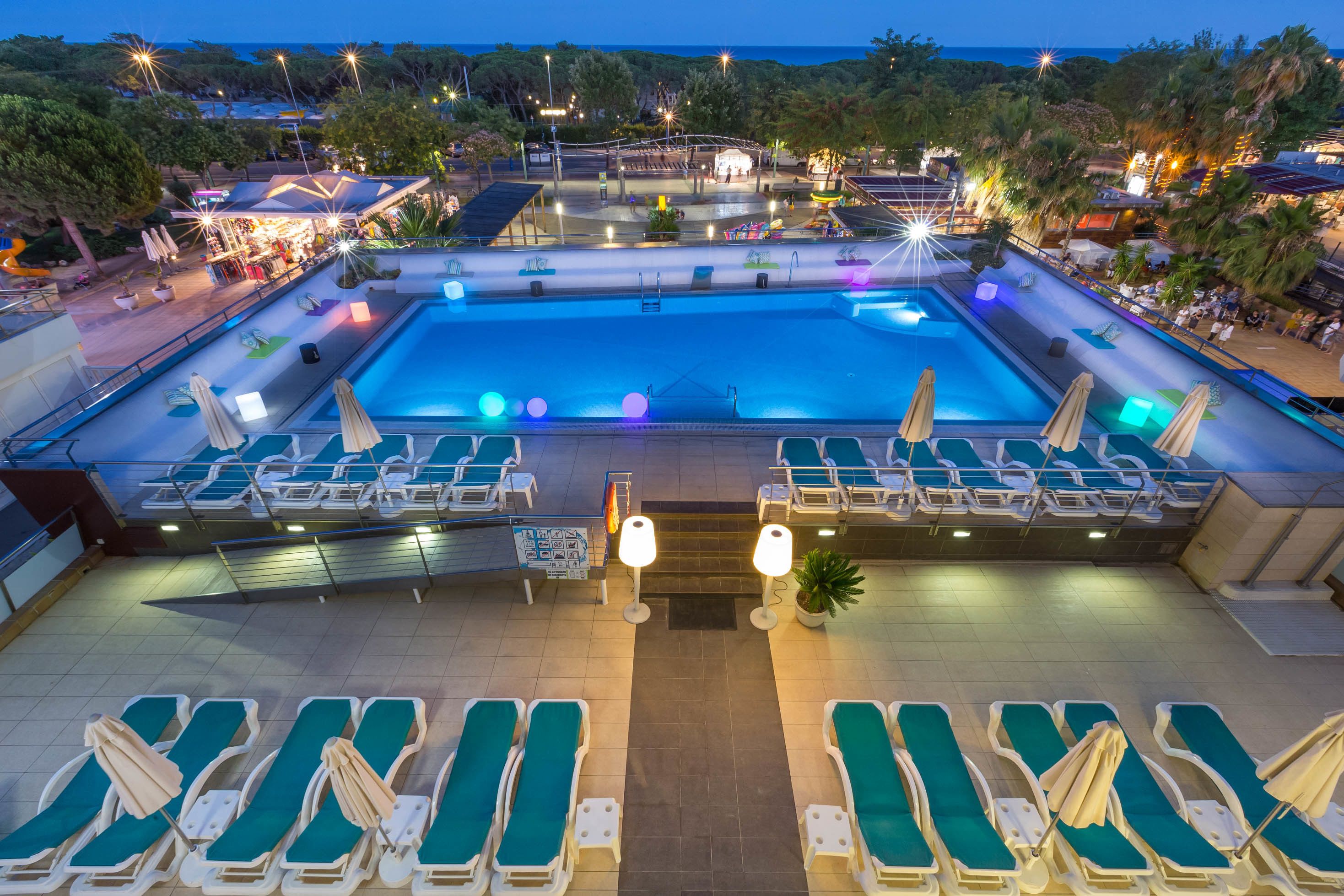 outdoor pool, pool umbrellas, pool loungers