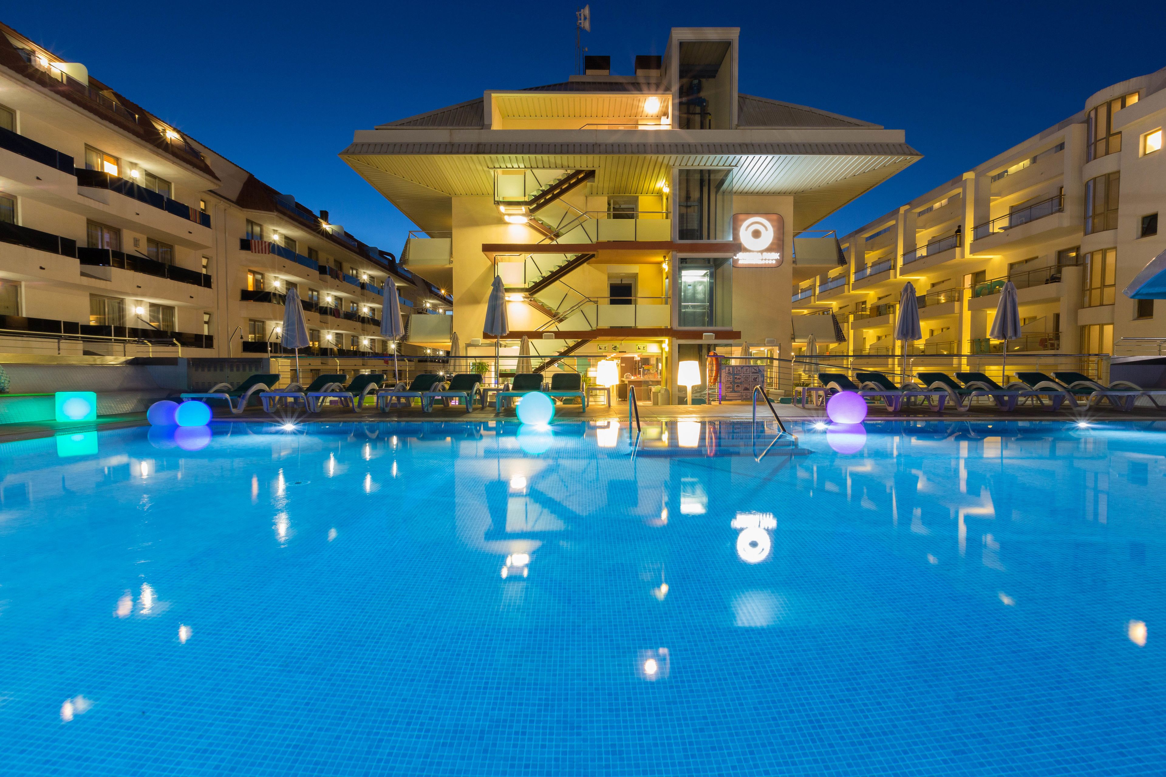 outdoor pool, pool umbrellas, pool loungers