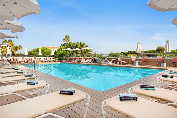 Outdoor pool, pool umbrellas, pool loungers