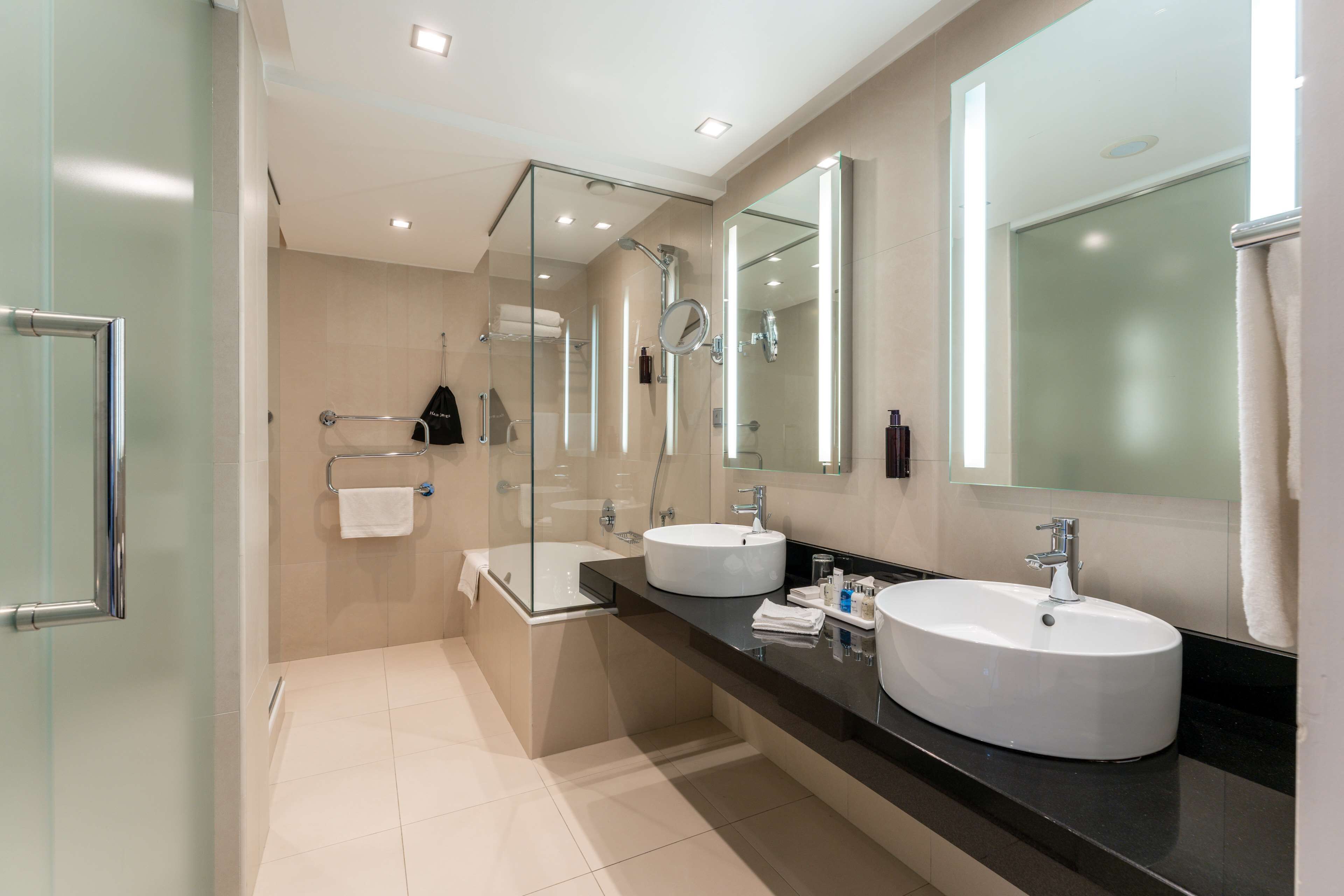 junior suite | bathroom | free toiletries, hair dryer, slippers, heated floors