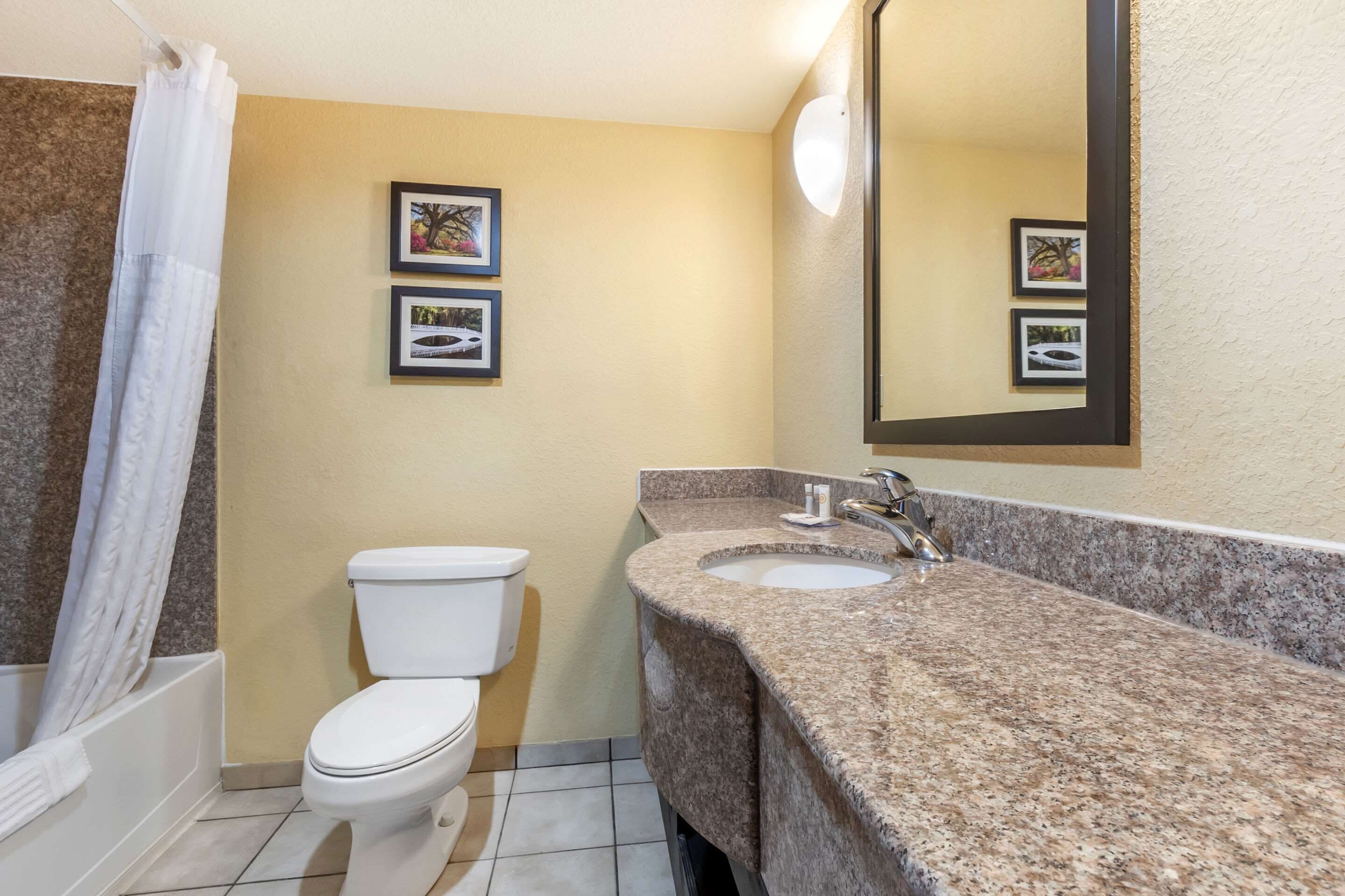 shower, rainfall showerhead, hair dryer, slippers